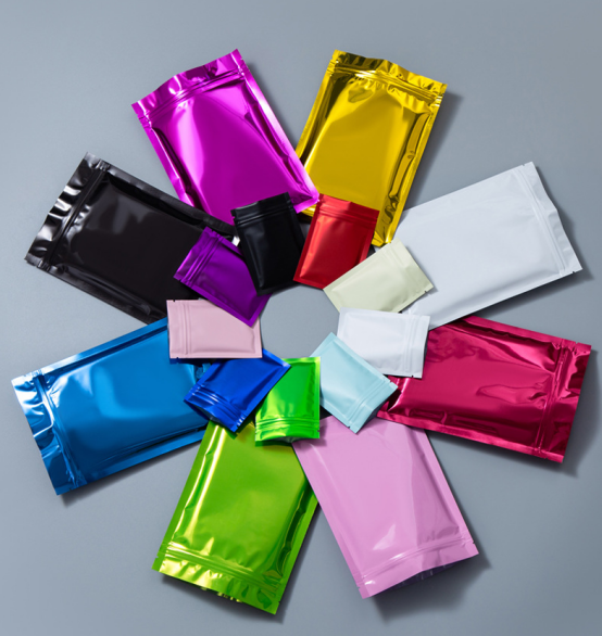 Double sided aluminized self sealing bag